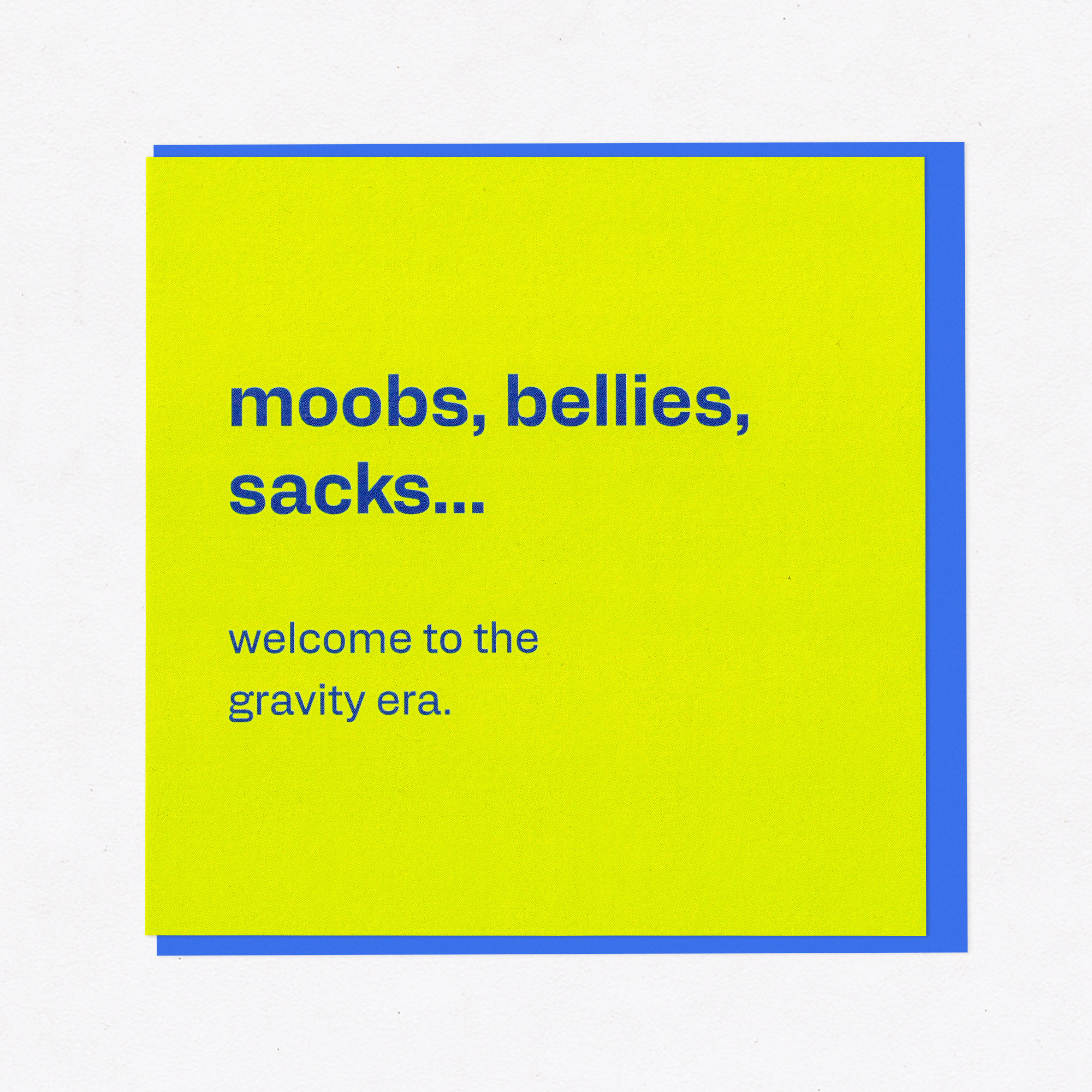 Moobs, Bellies, Sacks… Welcome to the Gravity Era - Funny Birthday Card for Him, the front of the card, photographed straight on.