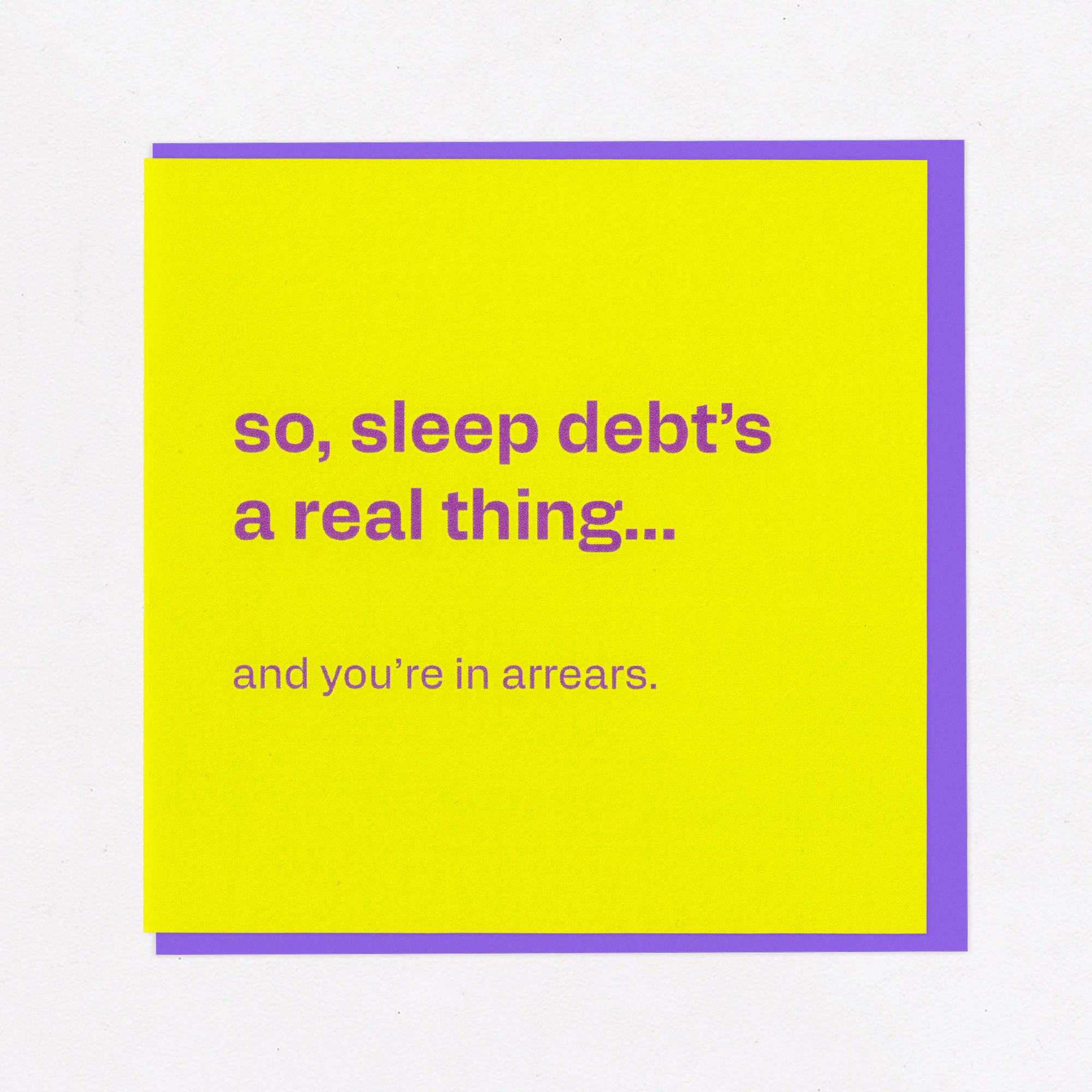 Sleep Debt Is Real - Funny Card for Surviving Adulthood, the front of the card, photographed straight on.