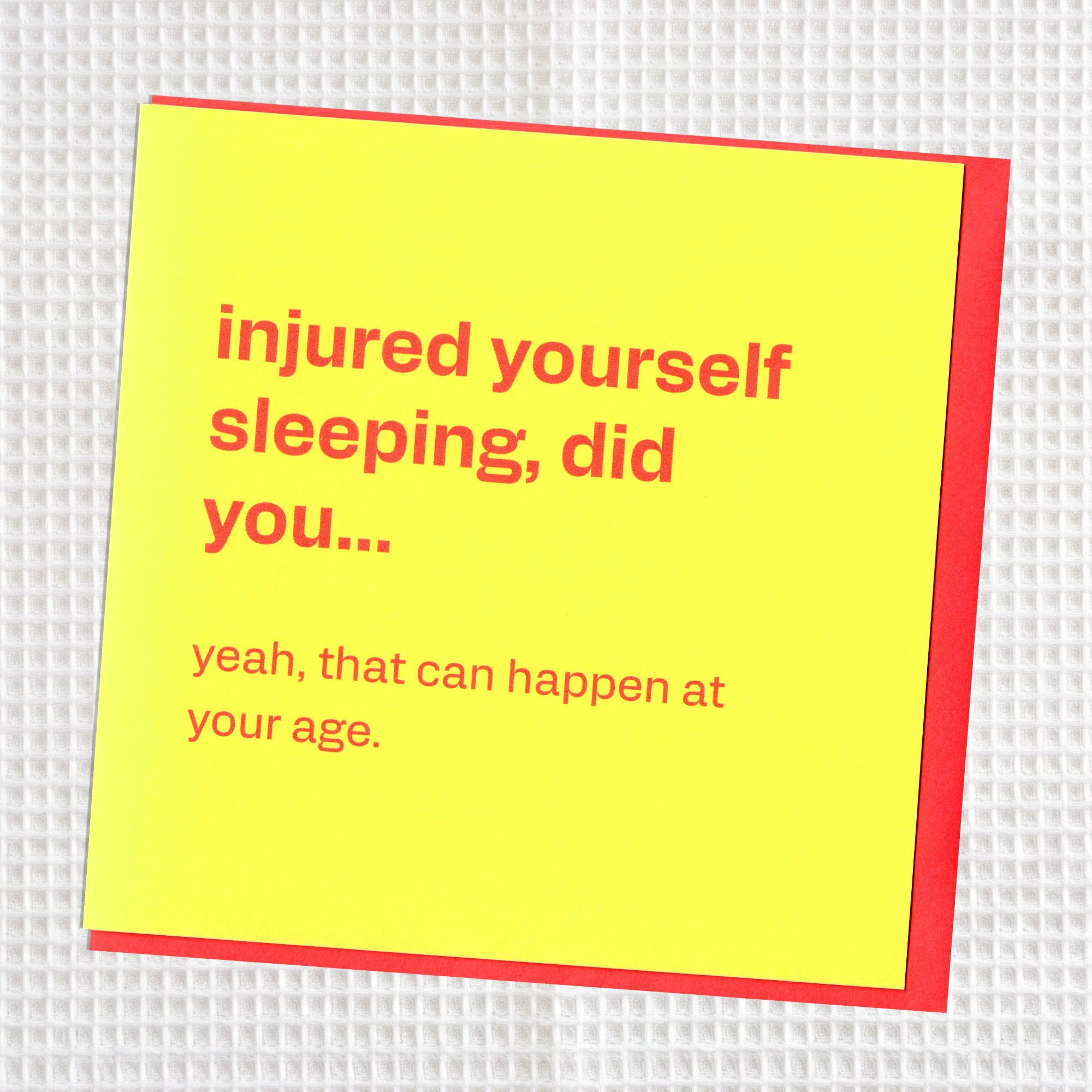 Injured Yourself Sleeping - Funny Ageing Birthday Card, in a real setting.